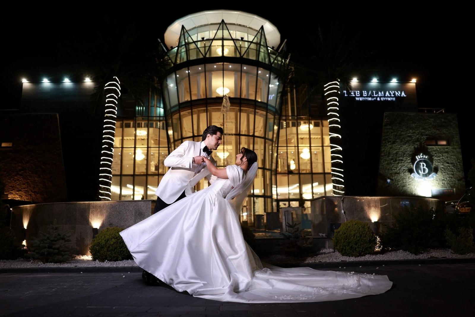 Bride and groom outside The Balmayna at night