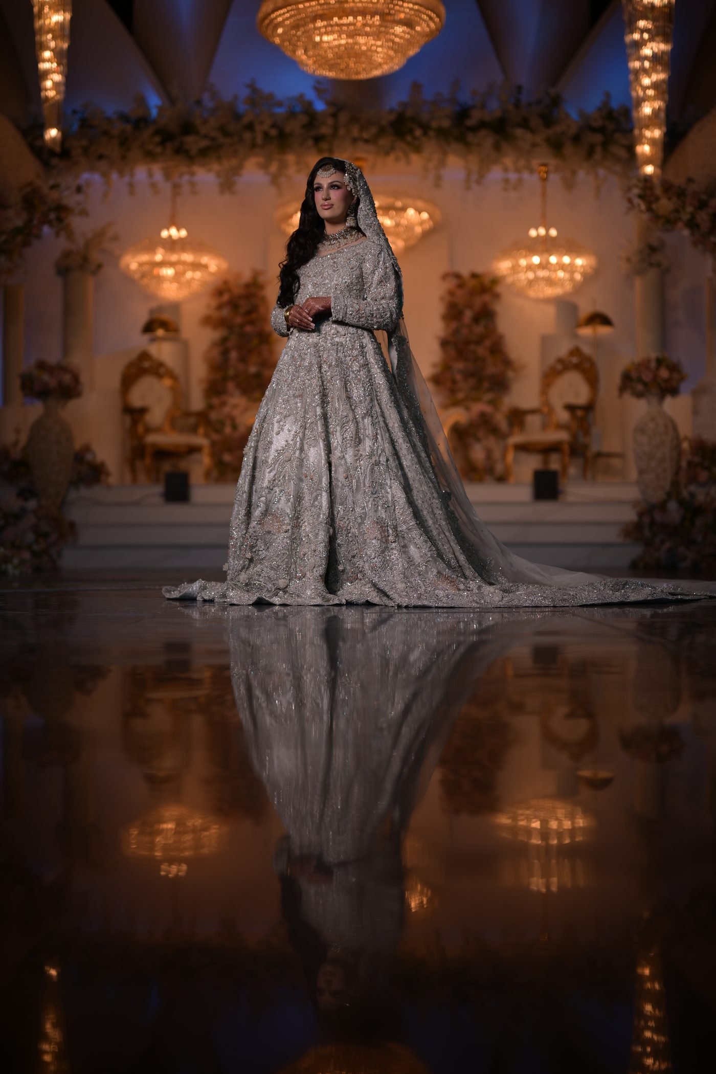 Bride standing on the stage at The Balmayna, reflected in the floor