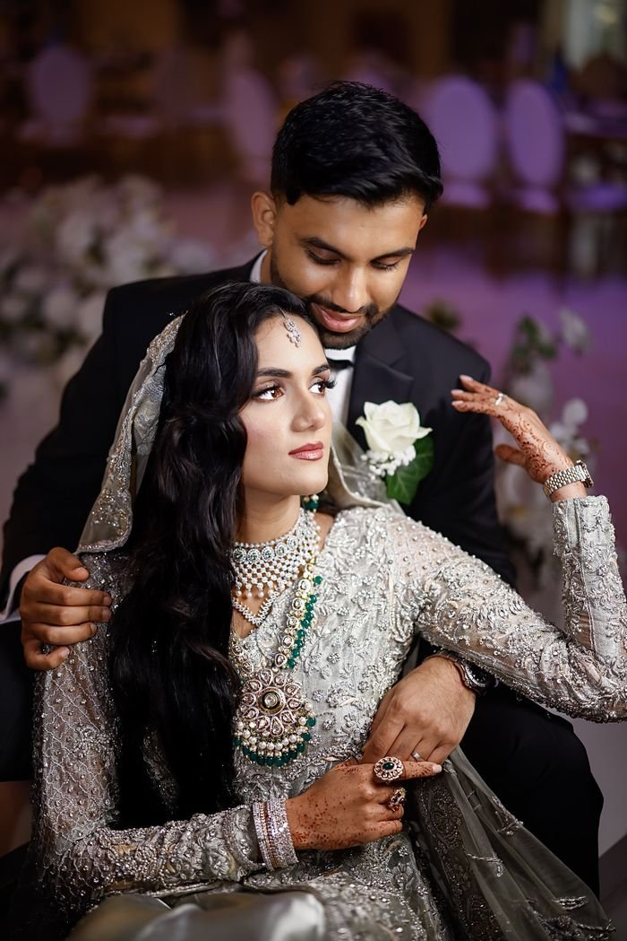 Bride and groom in a close embrace
